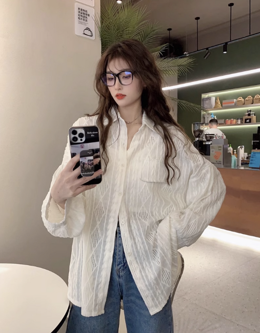 Fashionable crocheted hollow long-sleeved sunscreen shirt for women autumn 2023 new casual versatile loose mid-length top